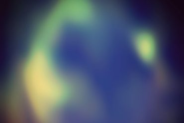 Awakener - The noises within, blurry purple and green shape