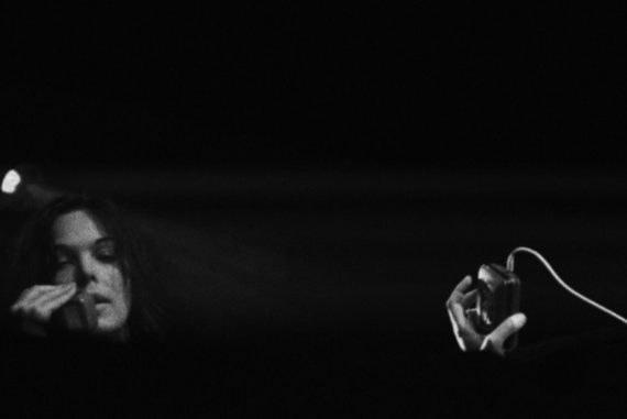 Second Edition - Olivia Block performing with a walkie-talkie