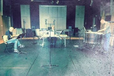 Michael Pisaro - Resting in a Fold of the Fog, faded blue photo of the musicians recording the album
