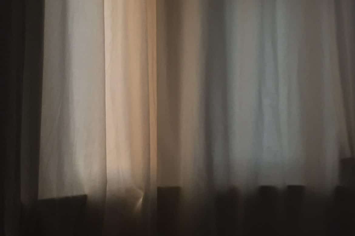 Kostis Kilymis - A Void, curtain with pale light filtering through