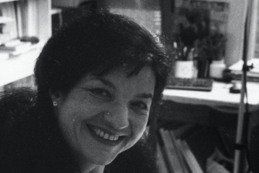 Pascale Criton - Infra, black and white image of the composer smiling in her studio
