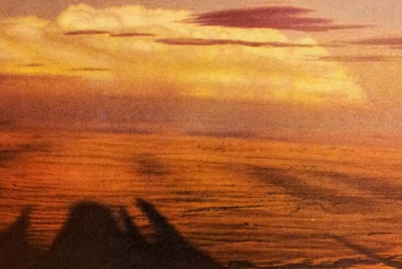 April Larson - You Stand in a Valley Between Dunes, a desert landscape with saturated colours and motion blur.