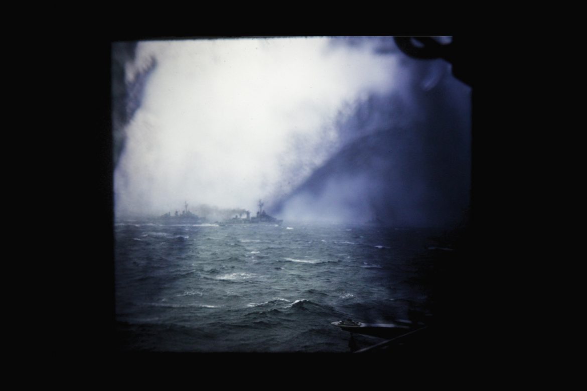 Olivia Block - Olivia Block, smoke-obscured photo of a battle at sea.