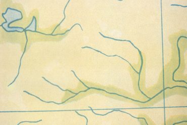 Ambient@40 conference, green map with rivers from the cover of Brian Eno's Ambient 1: Music for Airports.