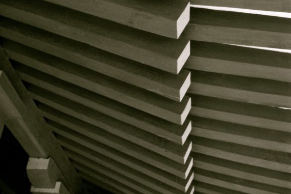Cyril Bondi - euhesma, 2017, looking down on architecture consisting of rows of grey concrete beams.