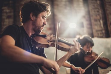 Phaedra Ensemble, two violinists performing.