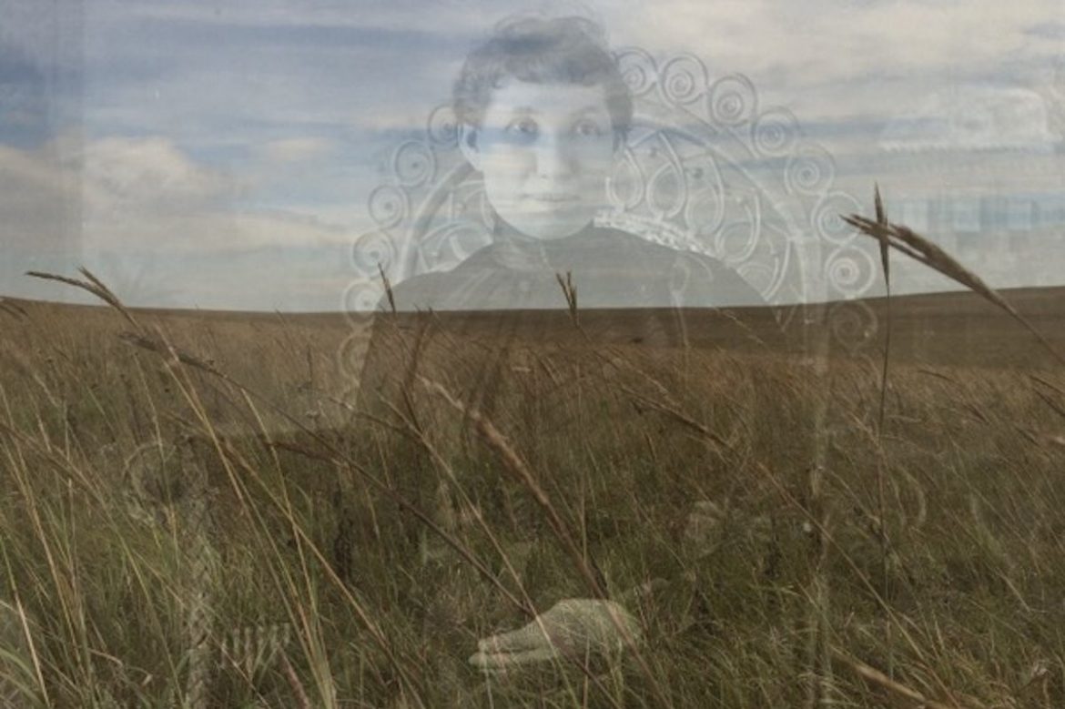 Nat Evans - Flyover Country, ghostly image of 19th-Century lady superimposed over a modern grassland plain.